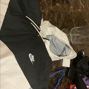 One new Nike hooded windbreaker